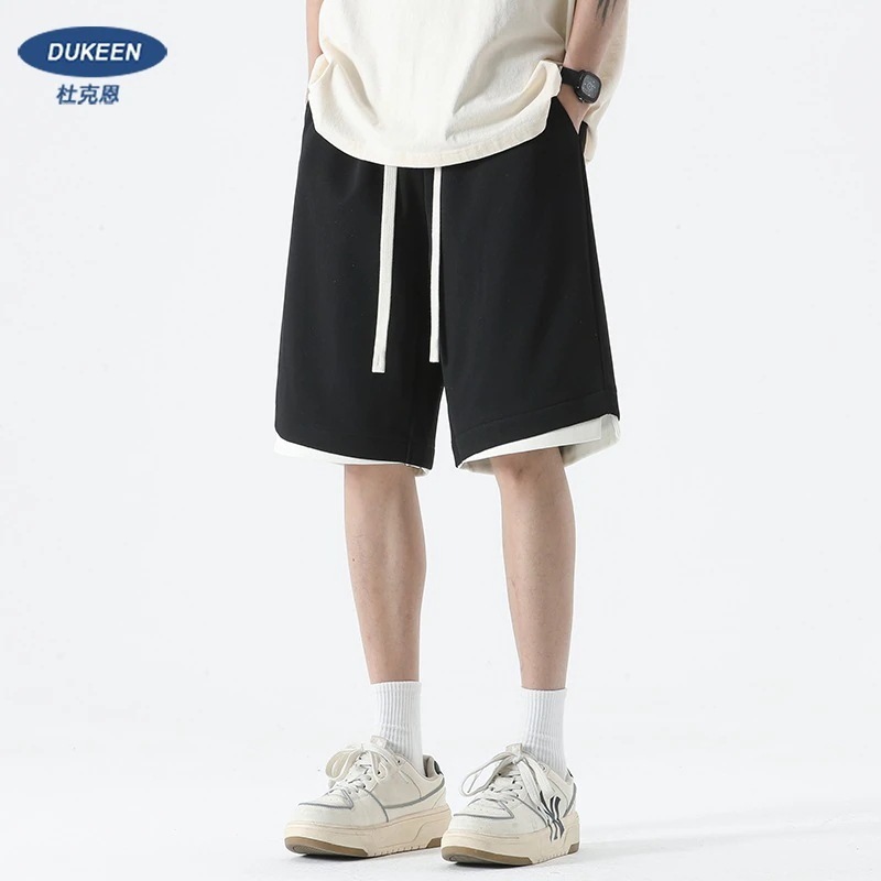 アメリカンヘビーウェイトスポーツショーツ男性用夏のランニング用フェイクツーピースカジュアルパンツトレンディーブランド男性用ルーズストレートレッグスリークォーターパンツ