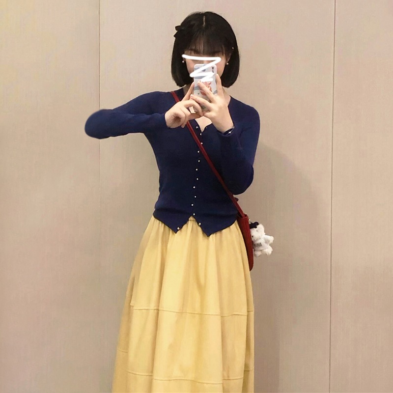 2024小人は秋冬にのロングスカートを一式着ています