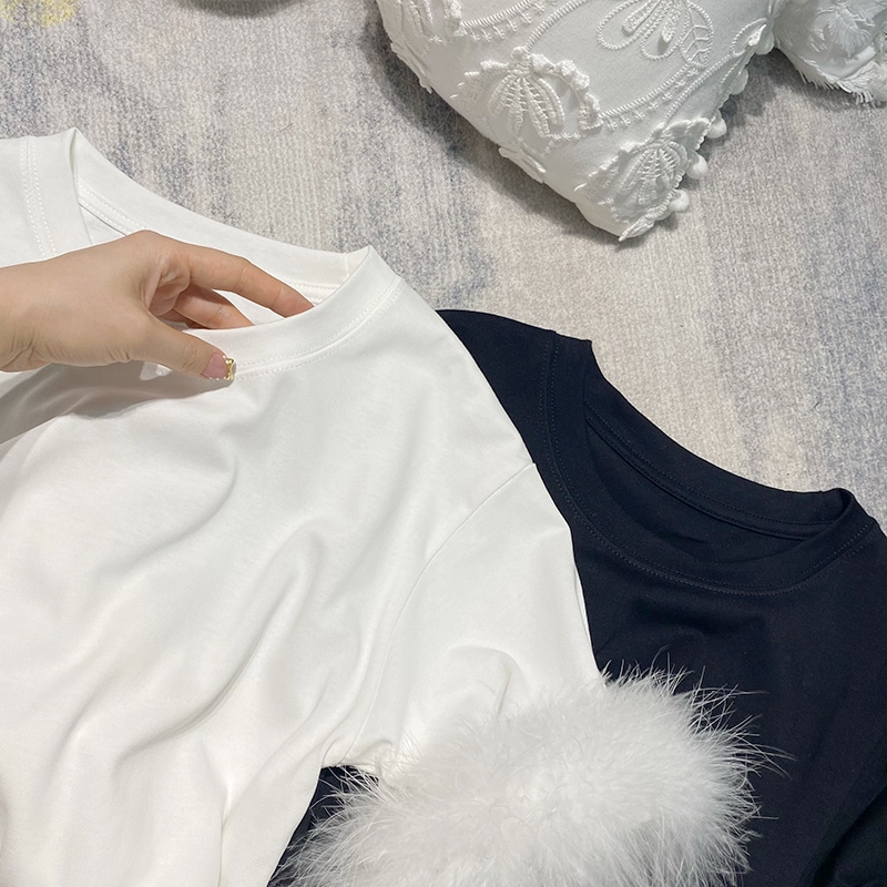 トップス カットソー Tシャツ プルオーバー ミディアム丈 半袖 フェイクファー かわいい 大人可愛い きれいめ シンプル 上品 おしゃれ かっこいい レトロ きちんと こなれ感 個性的 主役級