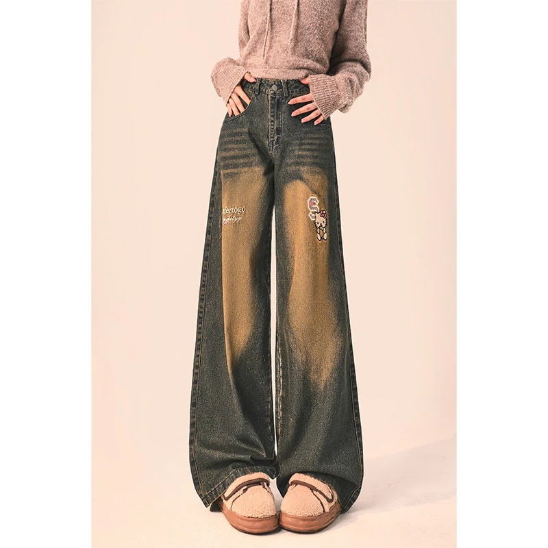 レトロな黄色の泥色のジーンズ女性秋冬モデルの厚い刺繍ブルーの狭いバージョンの広脚ストレート長ズボン