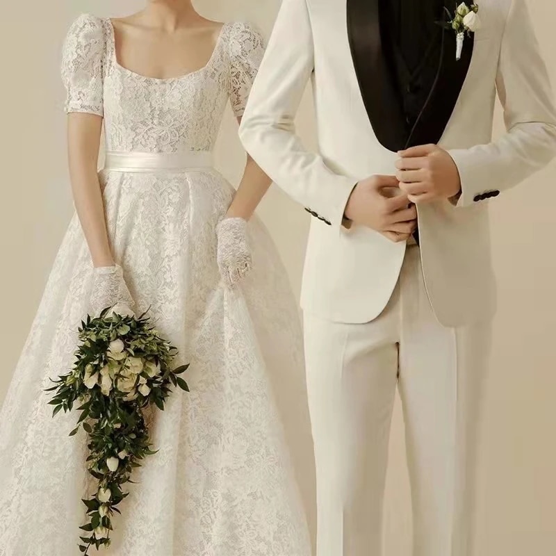 韓国式レースの軽いウェディングドレスの新型新婦が出て行って大きいサイズは簡単に迎賓します