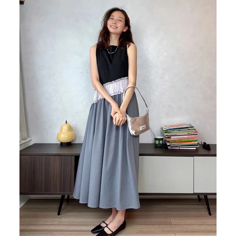 撞色継ぎ手ワンピース女 2025春夏新小人数デザイン感袖なしスリムA字ロングスカート