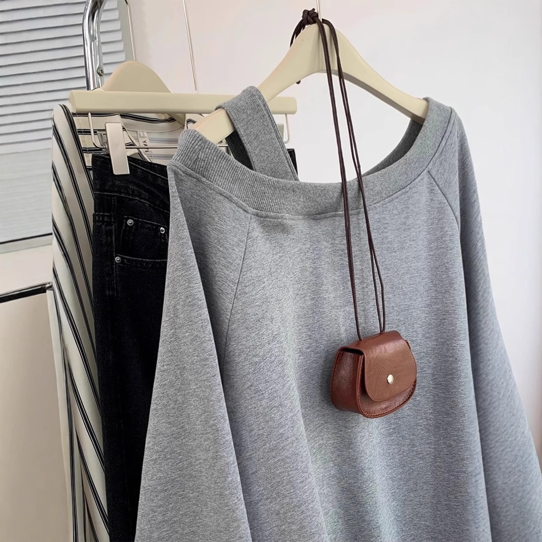 レディース用グレーのオフショルダーのゆったりとしたカジュアル スウェットシャツ2025 年春秋の新スタイルプルオーバーの長袖トップス/ジャケット