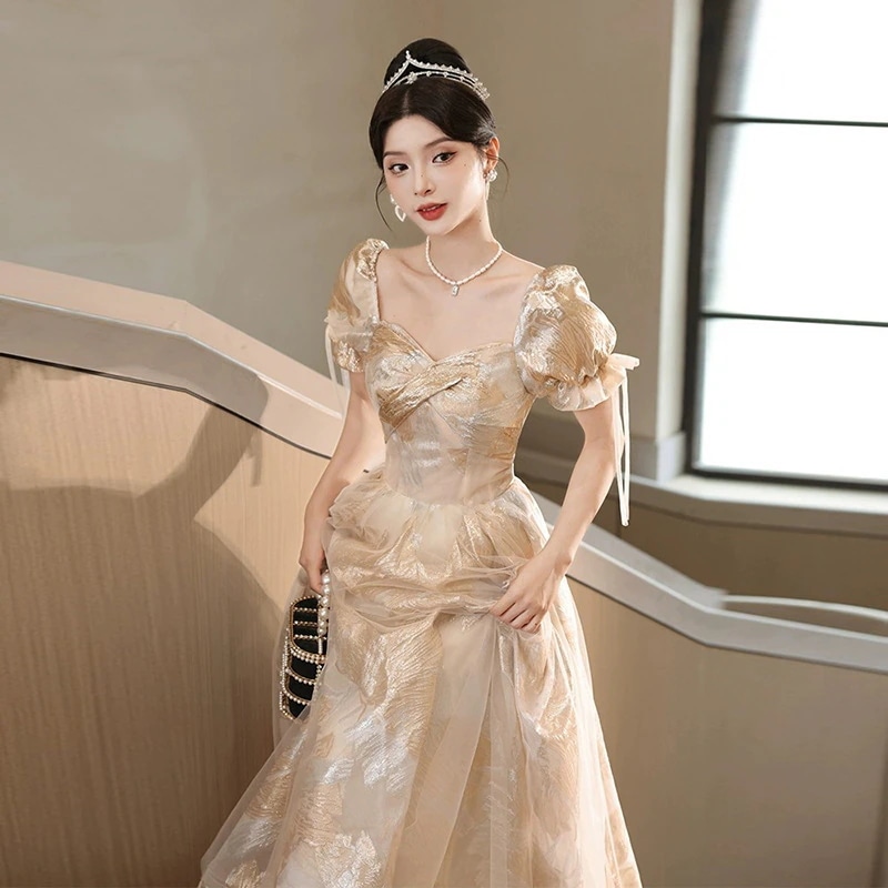 タキシードスカート2026金色の芸術考晩餐会司会者高級感