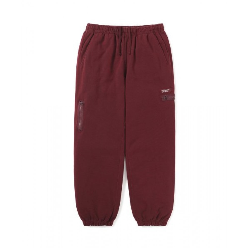THIS IS NEVER TAT マルチジップスウェットパンツバーガンディー