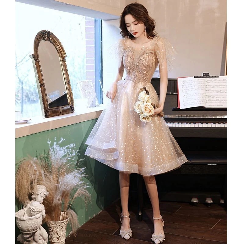 女性パーティーのためのシャンパンカラードレスプリンセスブライドメイマイドスカートバースデーアート試験ホストドレス小さな人