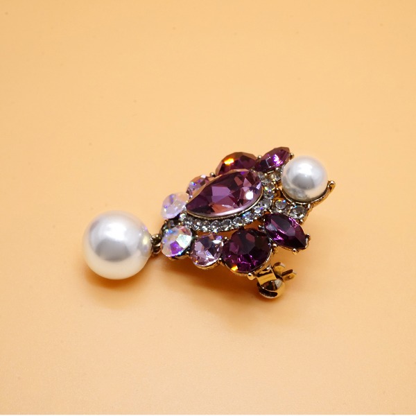 パープルスワルクリスタルブローチ