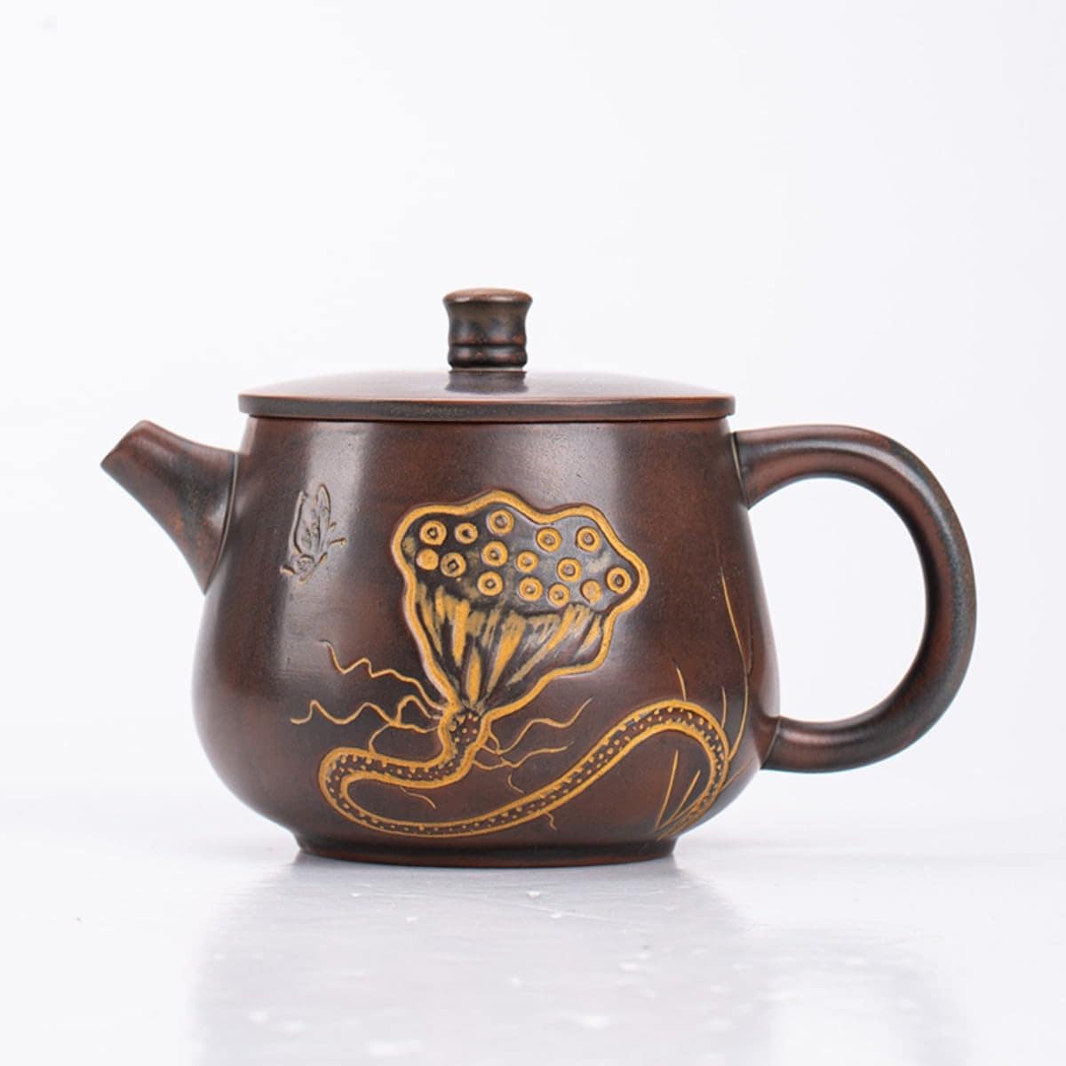 エンボス加工が施された手作りのティーポットTraxomiの繊細な丸みを帯びた注ぎ口が特徴ですご家庭でのご使用に最適ですプーアル茶を淹れるのに最適な中国風の陶器製ティーセットです (レッドブラウ
