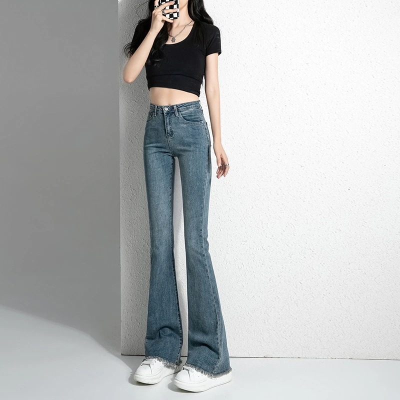 レトロなハイウエストの薄いジーンズ女性新しいスリムマイクlロフレア生エッジパンツ