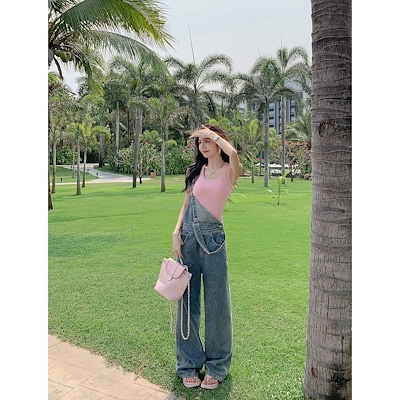 ムルバンのレトロな青いデニムの背もたれのズボンの女性の夏のゆったりしているのが見えます