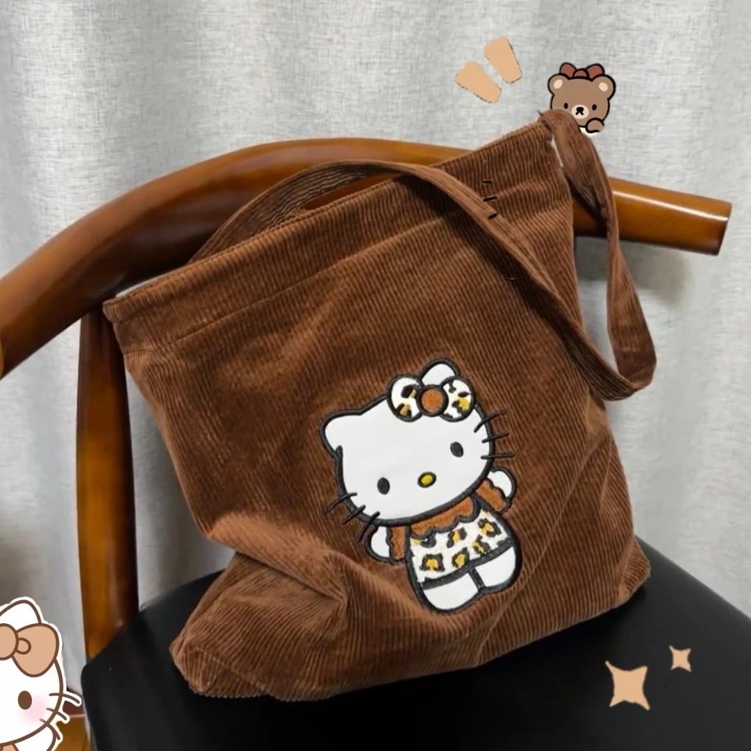 【2個買うと1個無料】日焼けキティ コーデュロイのハンドバッグ秋冬の乙女心斜めショルダーバッグ キティ大容量オールインワンショルダーバッグ