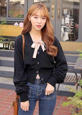 か細いカーディガン