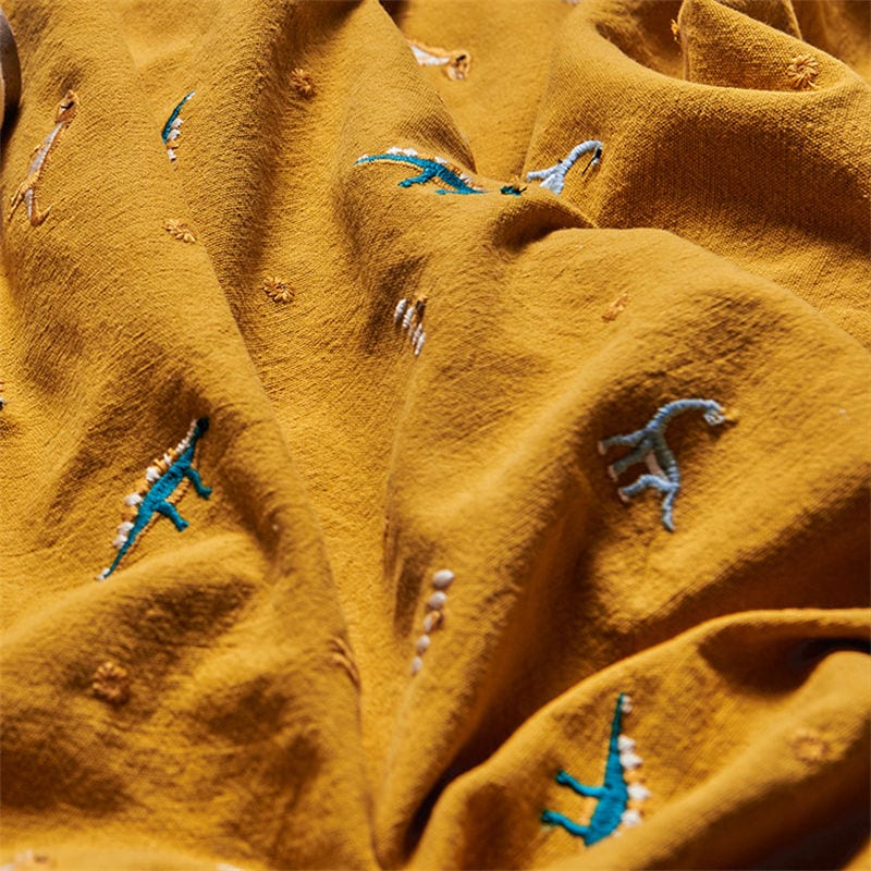 夏季新品限定幅120cm 90cm単位 生地 布 綿麻生地 刺繍生地 恐竜柄 手芸 裁縫 DIY イエロー ブラウン