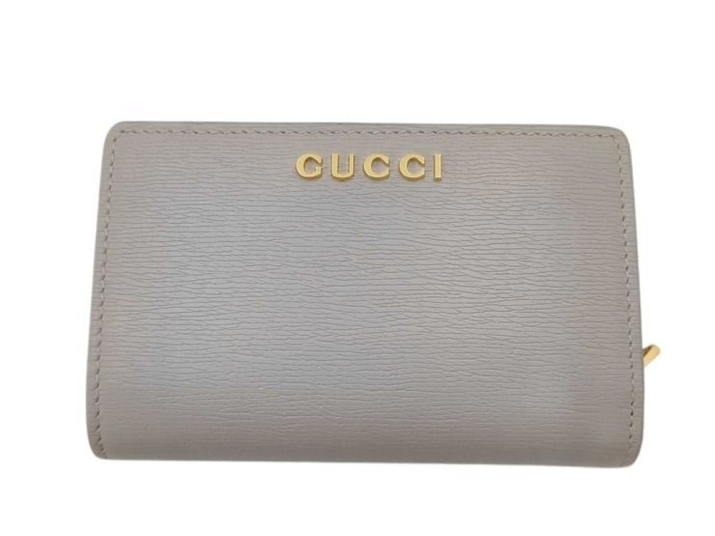 二つ折り財布 スクリプト 772640 レザー - ロゴ L字ファスナー ゴールド金具 グレー系 コンパクト ウォレット 人気 ブランド プレゼント メンズ レディース【本物保証】