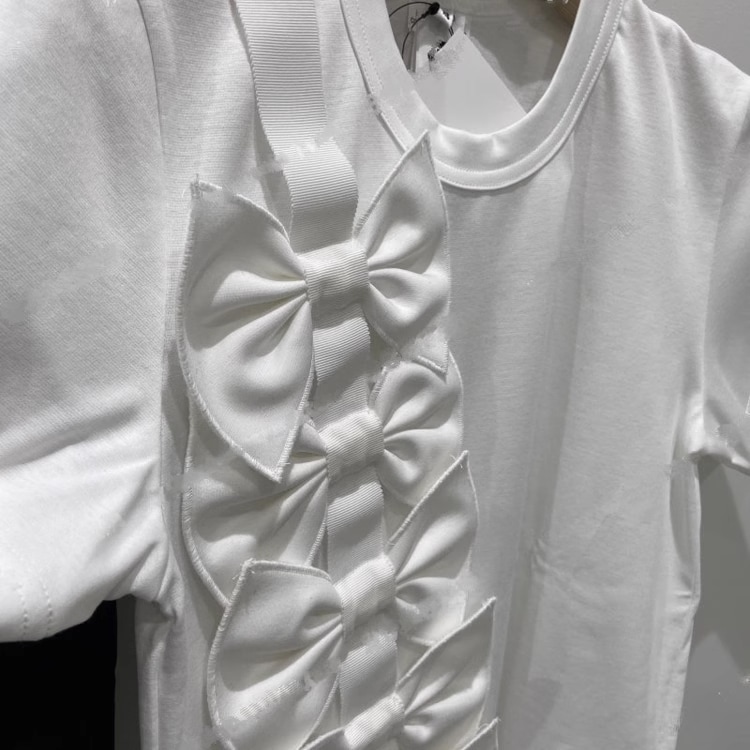 春 夏 ラウンドネック リボン 装飾 トップ ルーズ 半袖 Tシャツ 女性 個性的 トップス 白トップス 袖あり 半袖 襟なし かわいい 大人可愛い きれいめ シンプル カジュアル 大人 上品