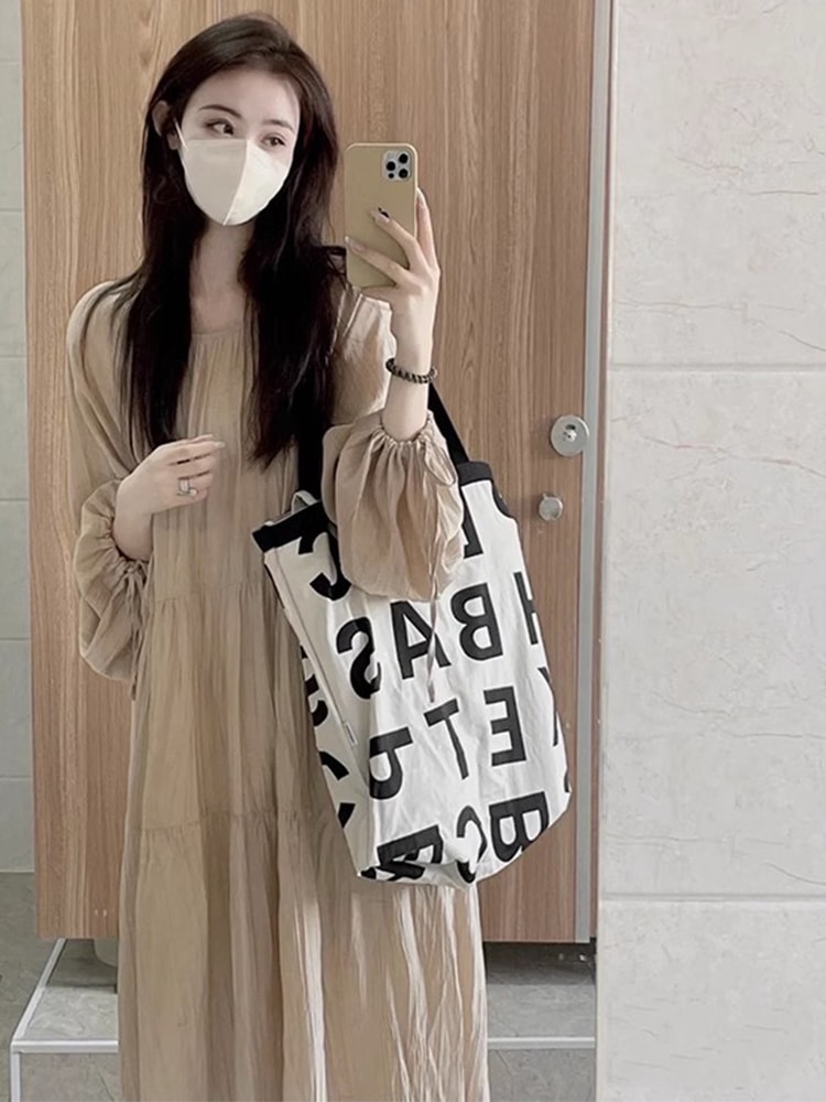 寒風長袖ワンピース子供夏2023新しい秋の摩耗シニアの質感の感覚海辺のリゾートロングドレス