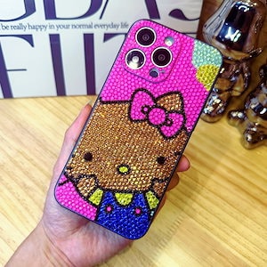 ハンドメイド iPhoneケース 日焼ハローキティ キラキラのラインストーン iPhone16/15/14/13/12/11ケース Plus Pro Max キティちゃん かわいい