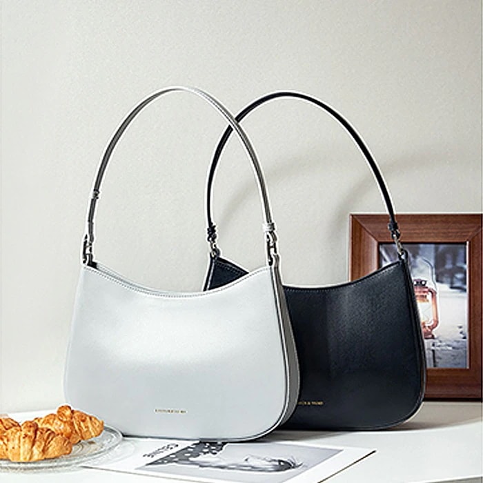 高級本革レディースバッグ脇の下バッグ新しいスタイルニッチデザインレディースバッグファッショナブルなショルダーバッグ 2025