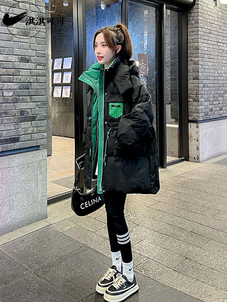 ヨーロッパ駅ダウン綿服女性2024冬の新型のつなぎ合わせはゆったりして痩せている中帽子付き綿服のコートが湿っている