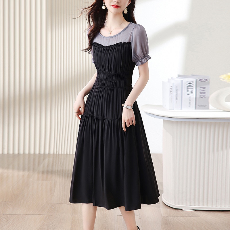 偽の2件のワンピースの女性2023夏の新型の丸首のパッチワークは腰を緩めて優雅な淑女の気質はお腹を隠してやせて見えます