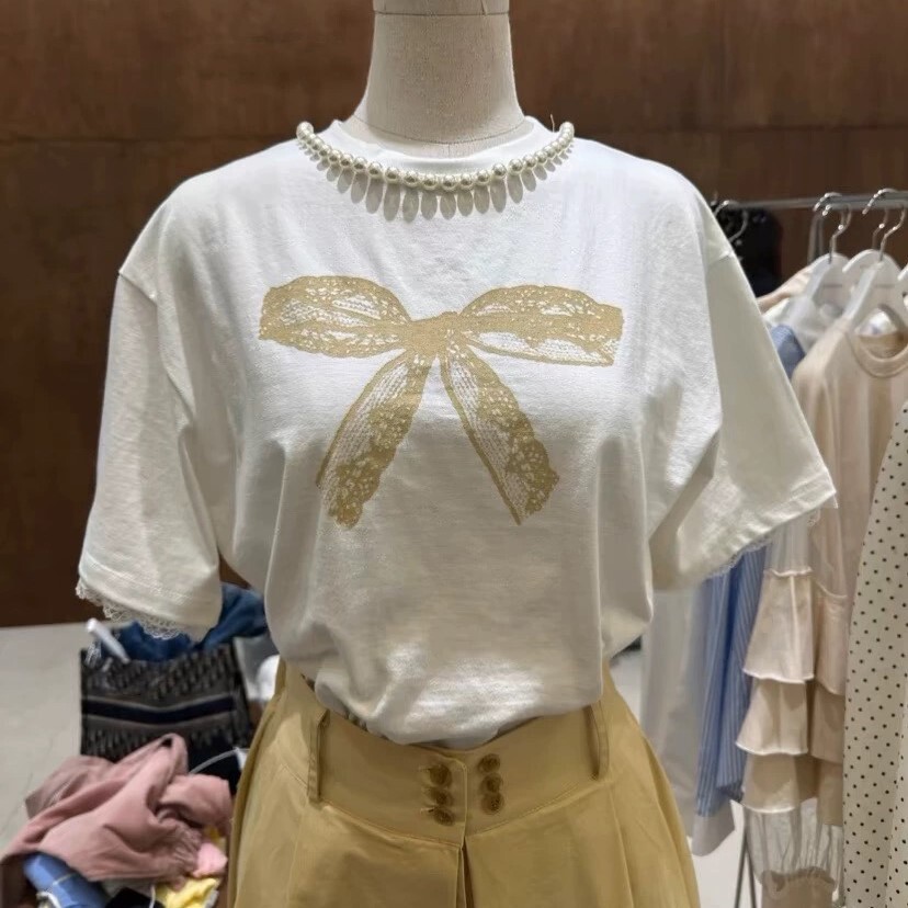 レディース Tシャツ トップス カットソー プルオーバー ミドル丈 半袖 クルーネック リボン 薄手 大人可愛い きれいめ シンプル カジュアル おしゃれ 個性的 抜け感 学生風 ナチュラル 7,896円