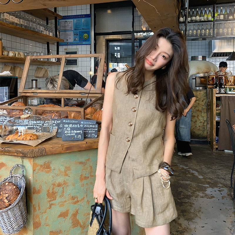 長いxier Old Qianfengカジュアルスーツ女性夏2025年の夏新しいノースリーブラインベストショーツ2ピースセット