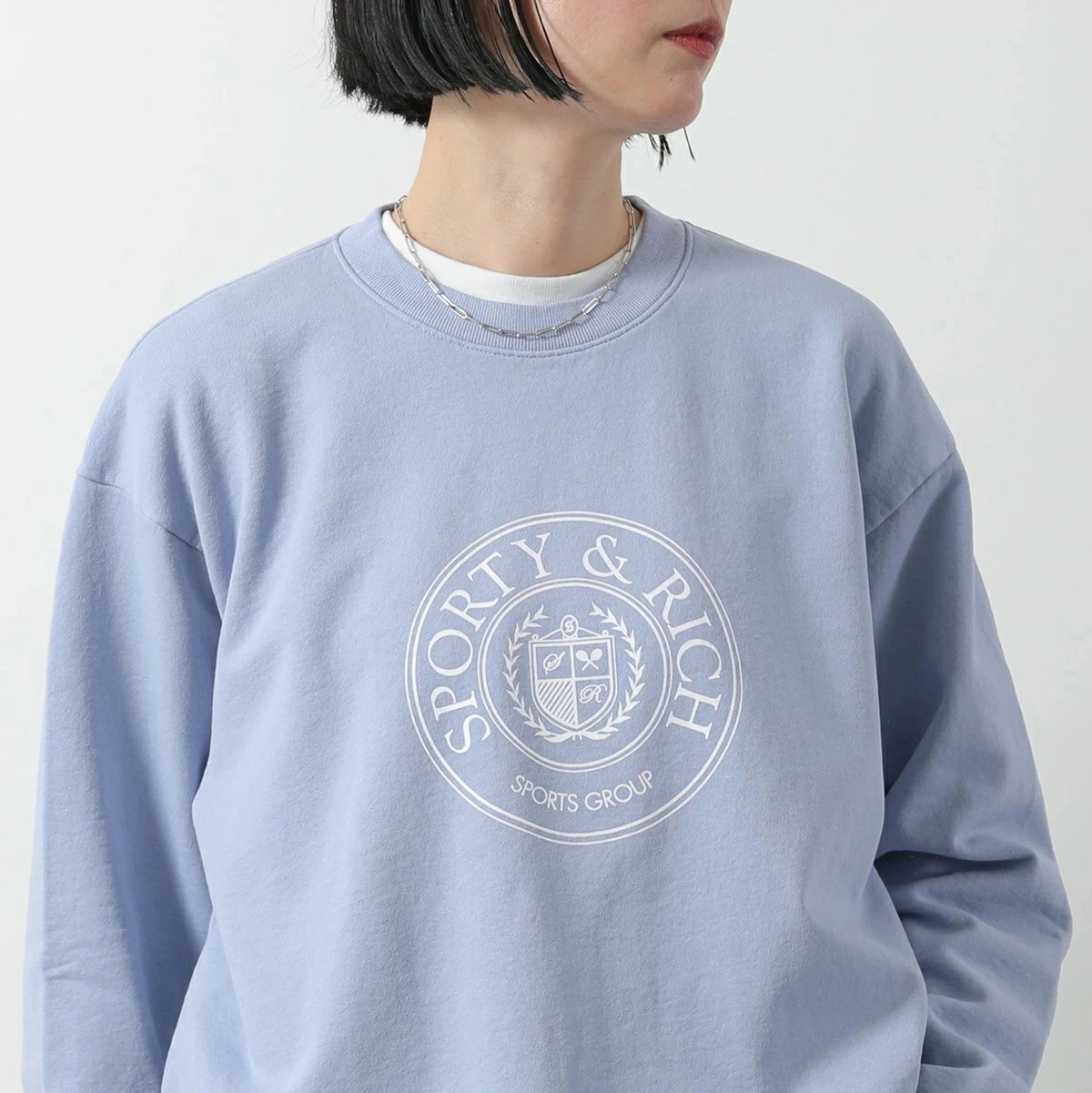 SPORTY＆RICH スポーティアンドリッチ トレーナー CRAW2341 レディース スウェット 裏起毛 ロゴ オーバーサイズ セットアップ可能 WASHED-PERIWINKLE