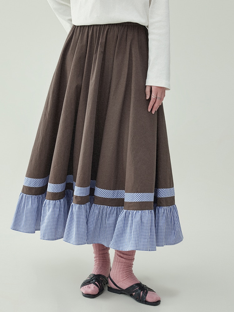 ファッションは格子の高い腰の半身のスカートの女性の早春の新型のa字の中で長いスカートをつなぎ合わせます