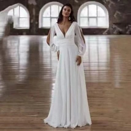 春の欧米の長袖vネックのシンプルな旅は軽いウェディングドレスを撮ります