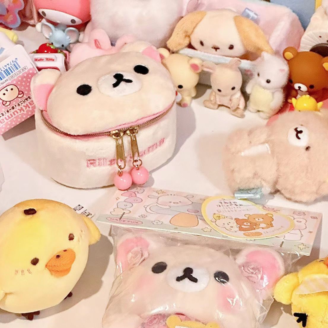 【1つ買うと10個もらえる】メガ割かわいいリラックマミニアクセサリー携帯旅行アクセサリー収納バッグ創意小銭入れ978