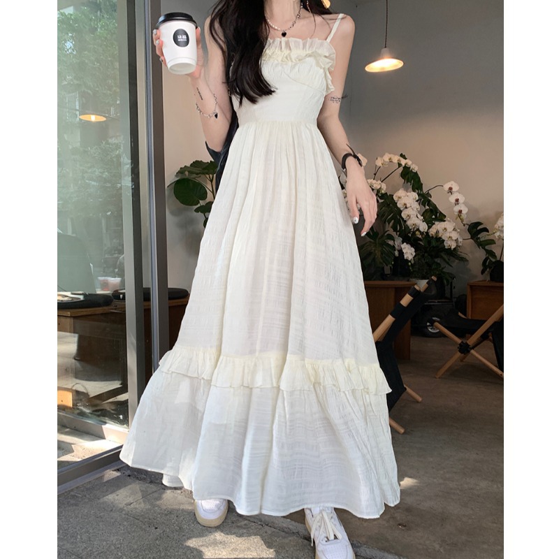夏の女性のための甘くて優しいスタイルのサスペンダードレス三亜海辺の写真撮影の雰囲気セクシーな菌ロングスカート