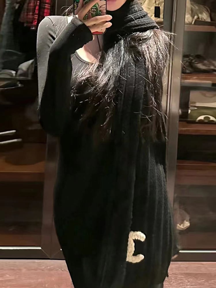 フレンチヘップバーンスタイル黒ニットワンピース子供秋と冬新作ボトムスロングスカート内の女性のコート