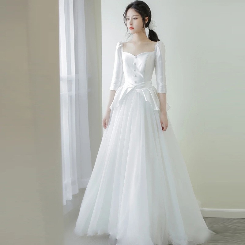 フランス式の軽いウェディングドレスの春の新型の小さい子のシンプルな旅は門の紗の森系の超仙の長袖のドレスの女性を撮影します
