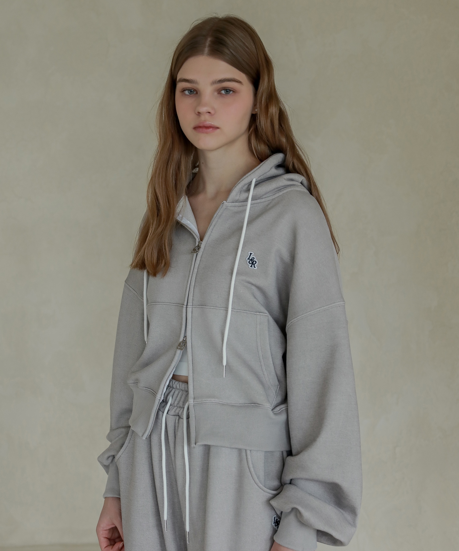 LOSSYROW ロッシーピグメントパッチフードジップアップ_グレー