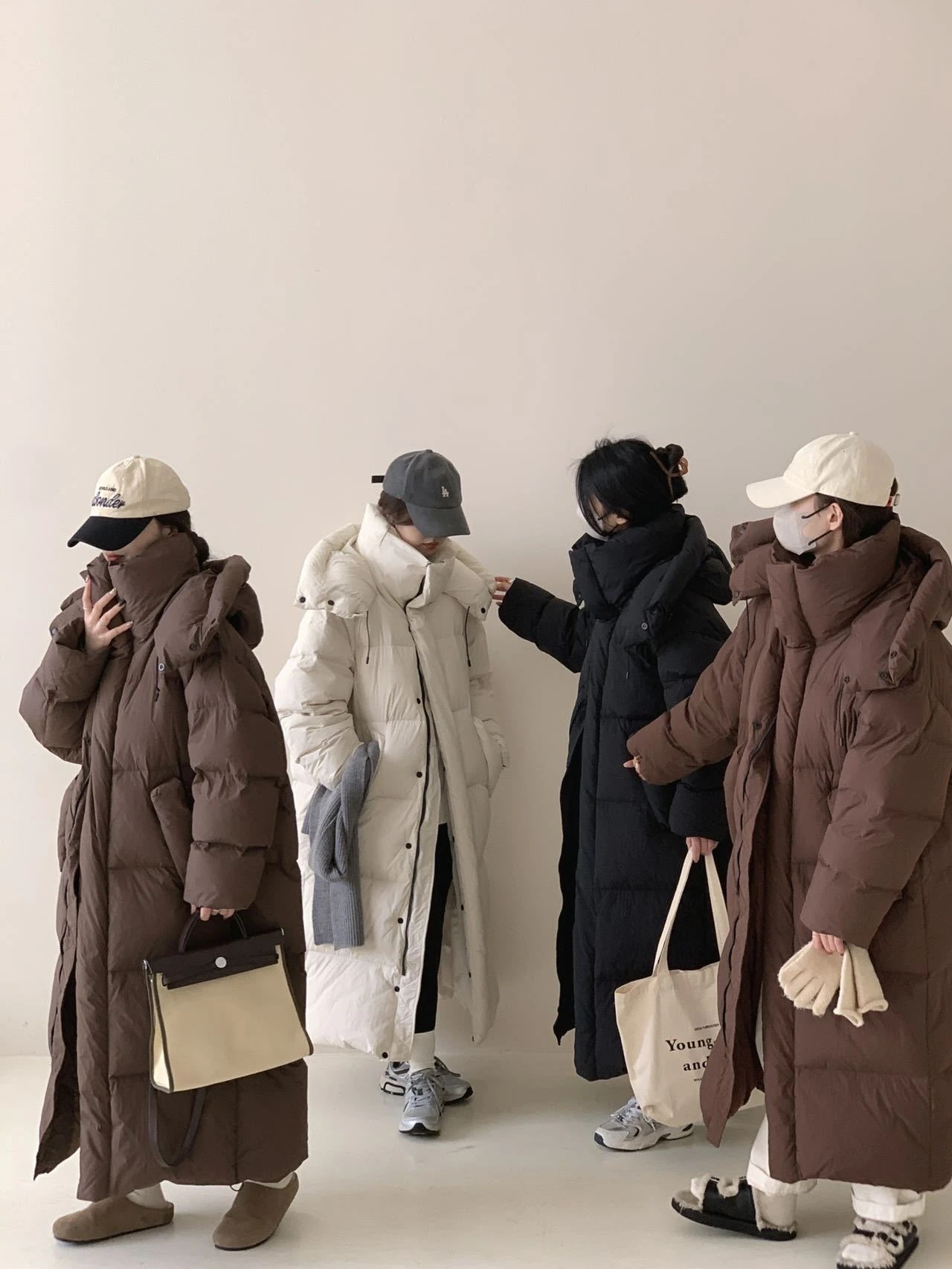 冬の新しい長いダウンジャケット女性フード付き韓国語厚く歩く膝のジャケットの上に大きなキルト