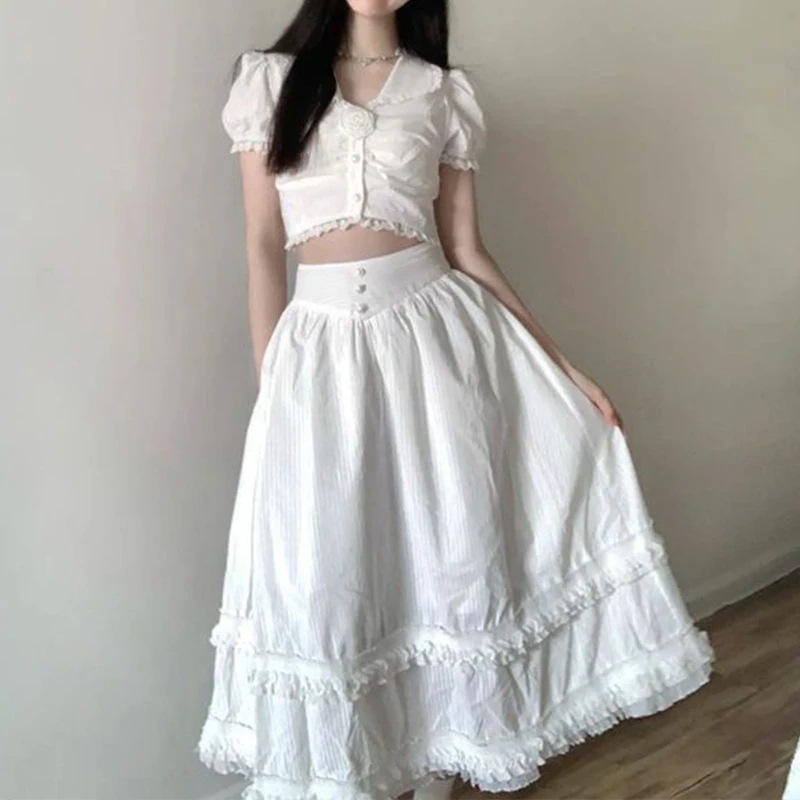 甘くてスパイシーな韓国風のユニークなデザインレディースの夏用パフスリーブシャツとハイウエストのスリミングスカートのツーピースセット