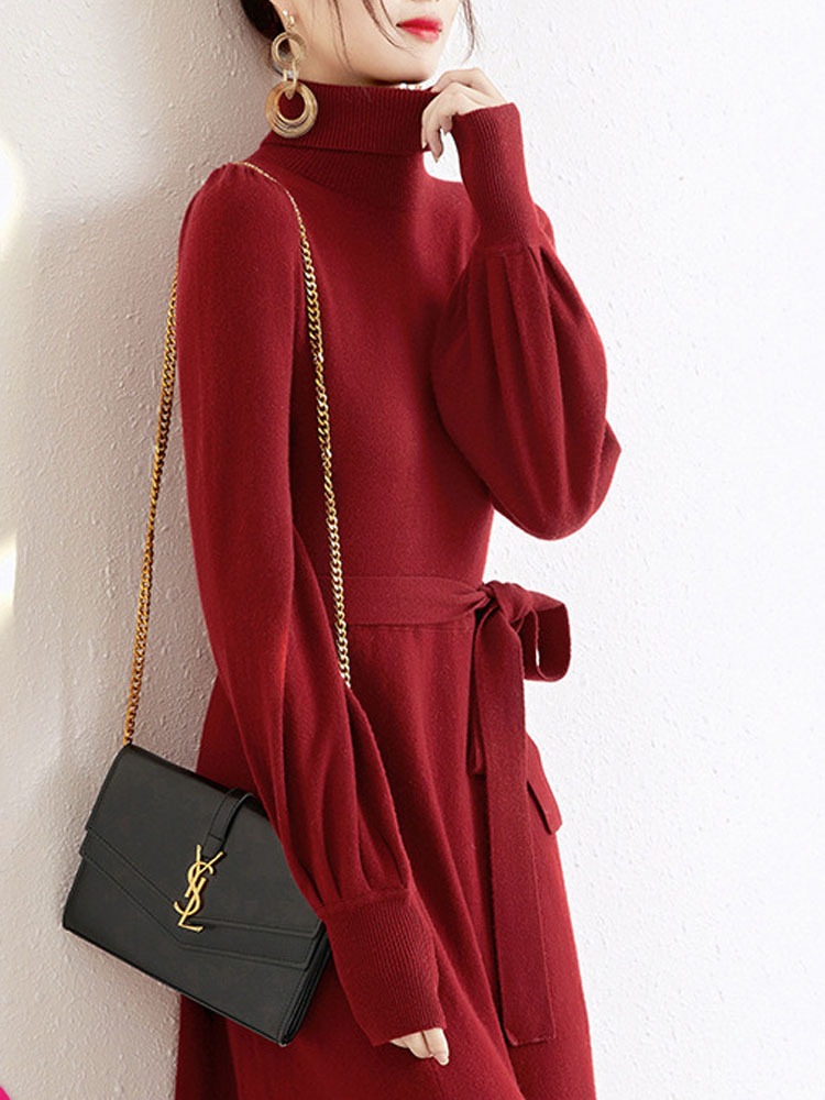 韓国版の優雅な気質のワンピースの新型秋冬のニットは身を修めてやせています