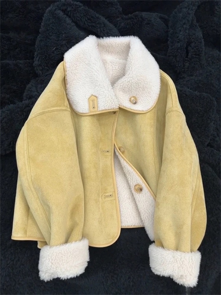 スエードの毛皮は一体的に羊の小毛の綿服をめくって女性の冬の新型の保温とベルベットの両面に厚いコートを着ます