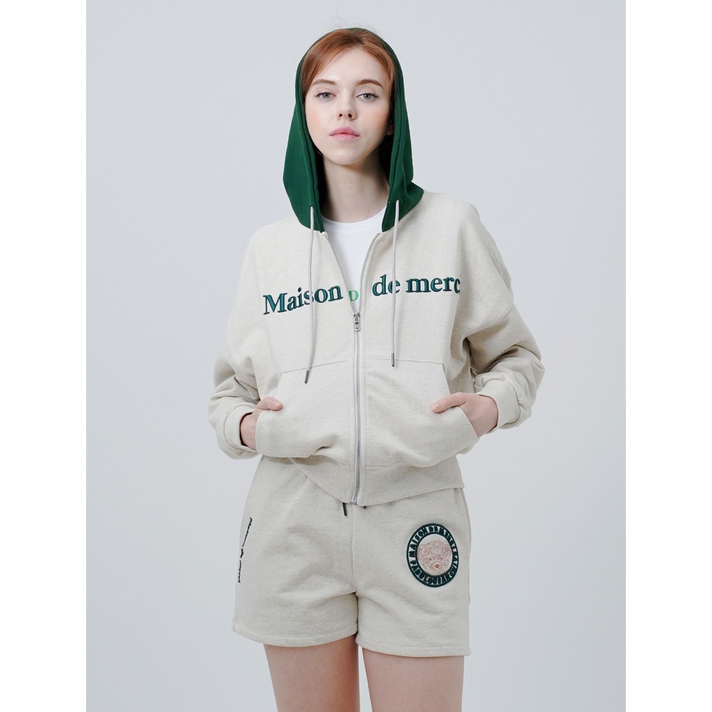 ファビュラスアーカイブ女性用エンボスロゴクロップパーカージップアップオートミール (FCC1ZP391W)