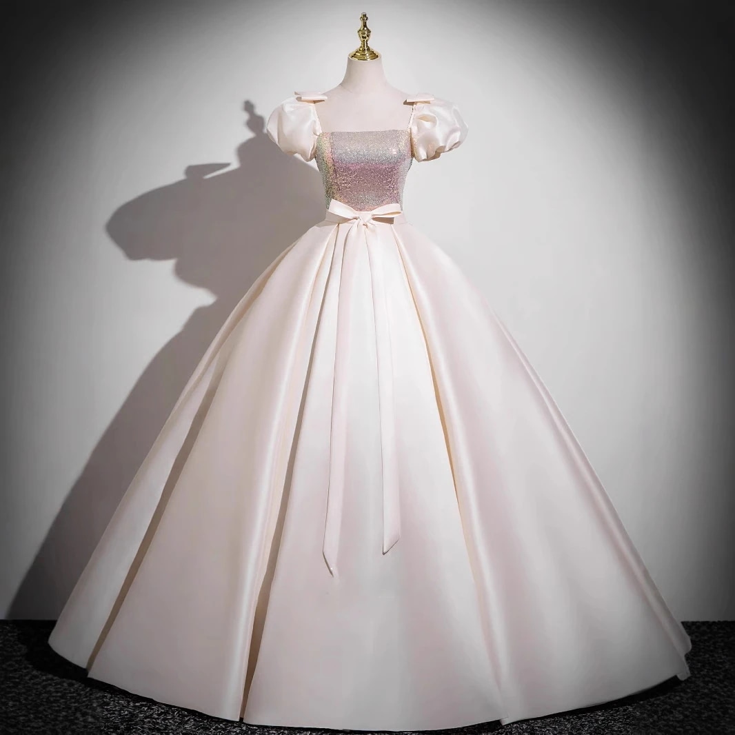 シャンパンカラーのフレンチスタイルの成人式イブニングドレス新しいハイエンド軽い贅沢ニッチ洗練された誕生日のプリンセスドレス
