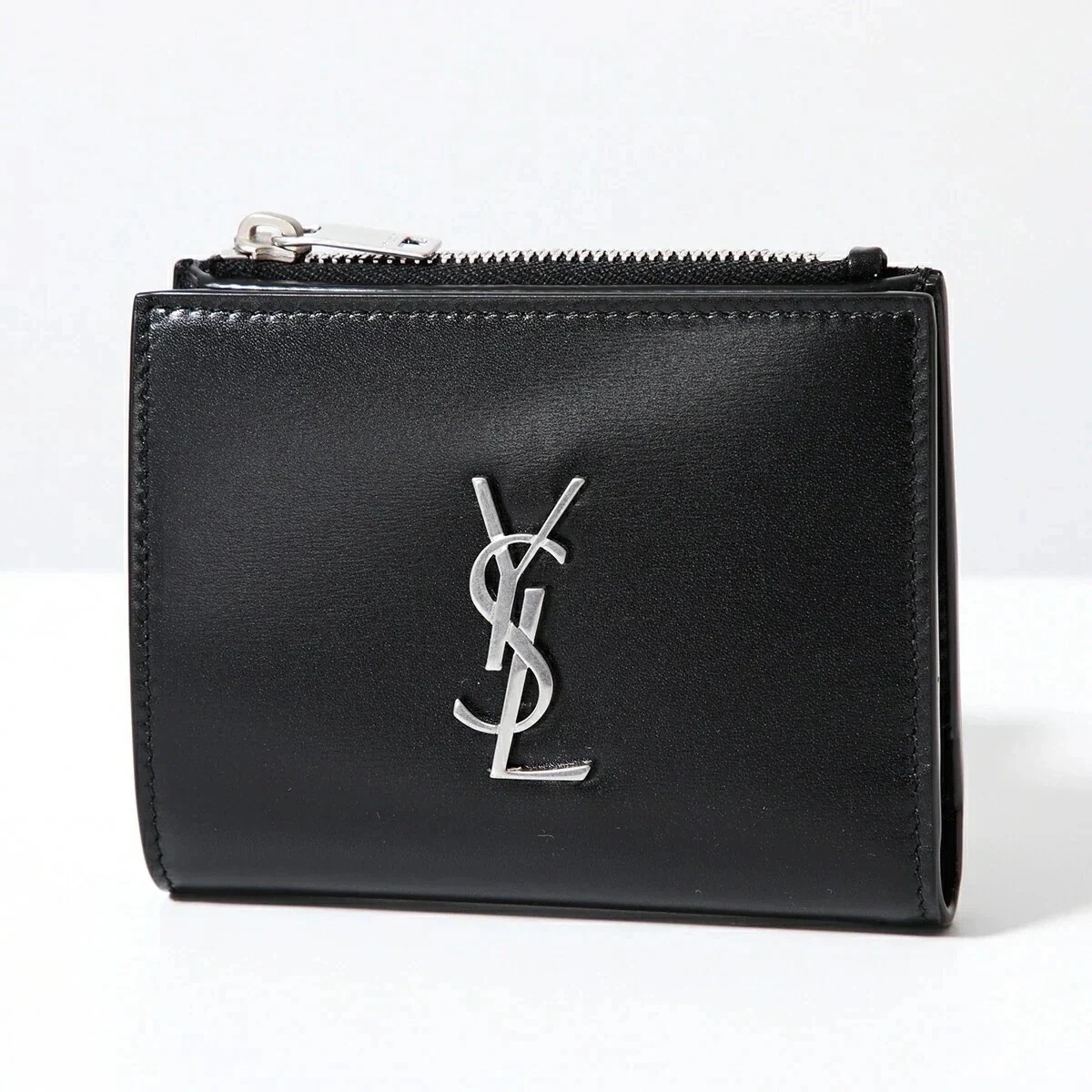 SAINT LAURENT サンローラン 二つ折り財布 575726 0SX0E メンズ カサンドラロゴ レザー 小銭入れあり ミニ財布 1000/NERO