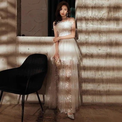 イブニングドレスの女性2025春仙気質の宴会生の女性の有名なフランス式のヘップバーンの羽毛の卒業のドレスです