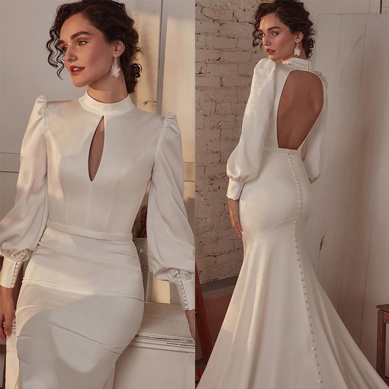 新しいフレンチドレスのスタンドカラーの長袖のセクシーな背中のショーの宴会のドレス 7,527円