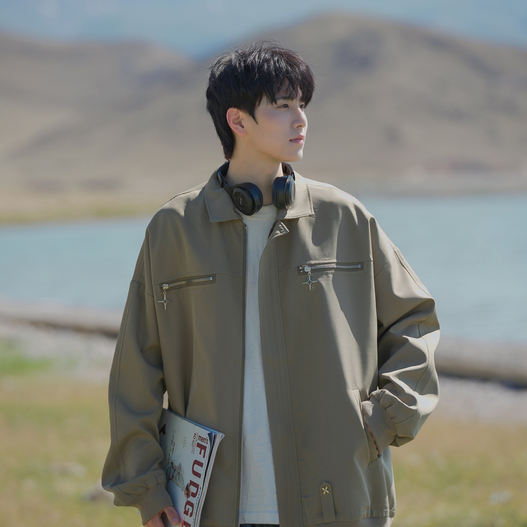 春と春のラペルカジュアルジャケットメンズ2023緩い緩い百潮潮のトレンドコート新しいワークウェアのトップス