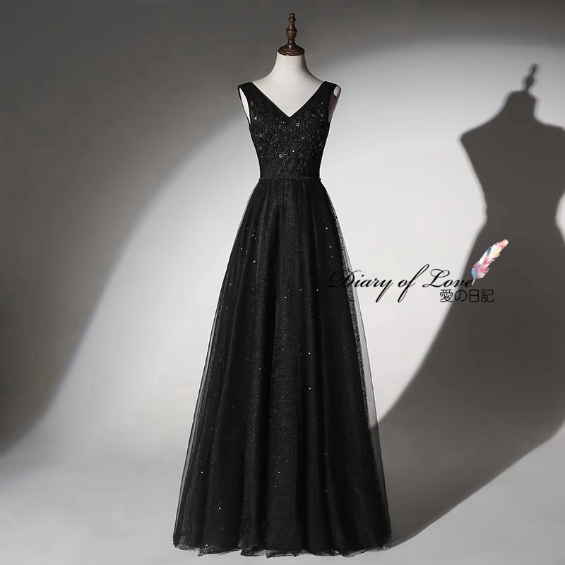 華やかなブラックラメチュールを重ねた1着