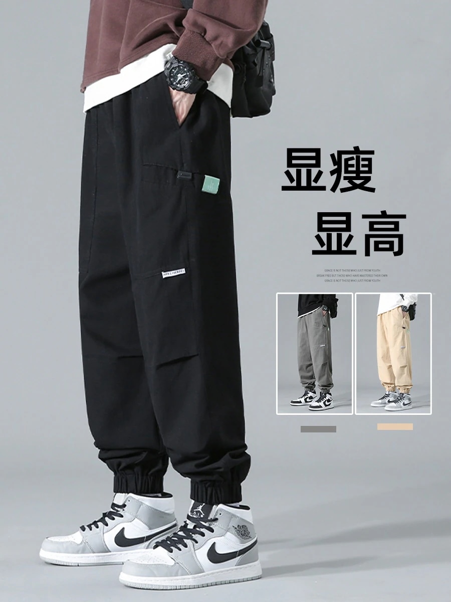 日本の作業ズボンの息子の男性のカジュアルズボンの潮の春秋冬秋と秋のl機能ドローストリング脚アメリカン大きいサイズ緩い落下傘ズボン