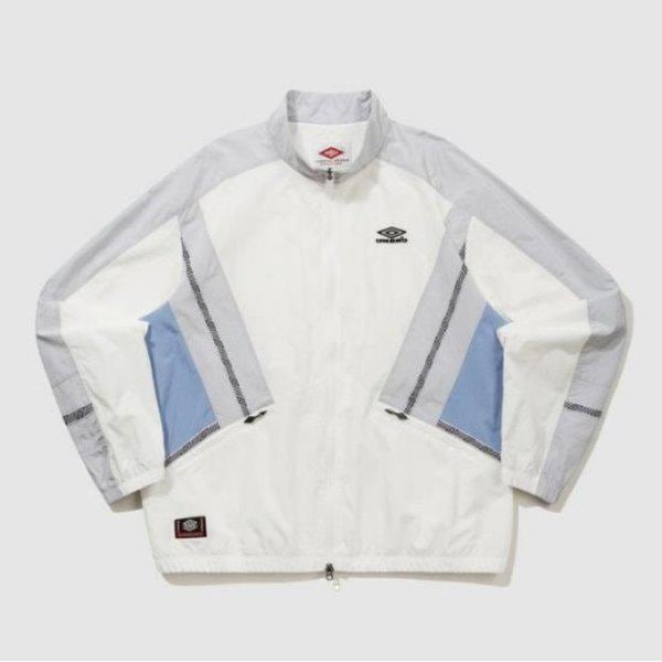 ウィンドブレーカー TQT UQ121CJK23-SCW HBL ノッティンガム スタンネック ウォームアップ ウィンドブレーカージャケット スイートコーン