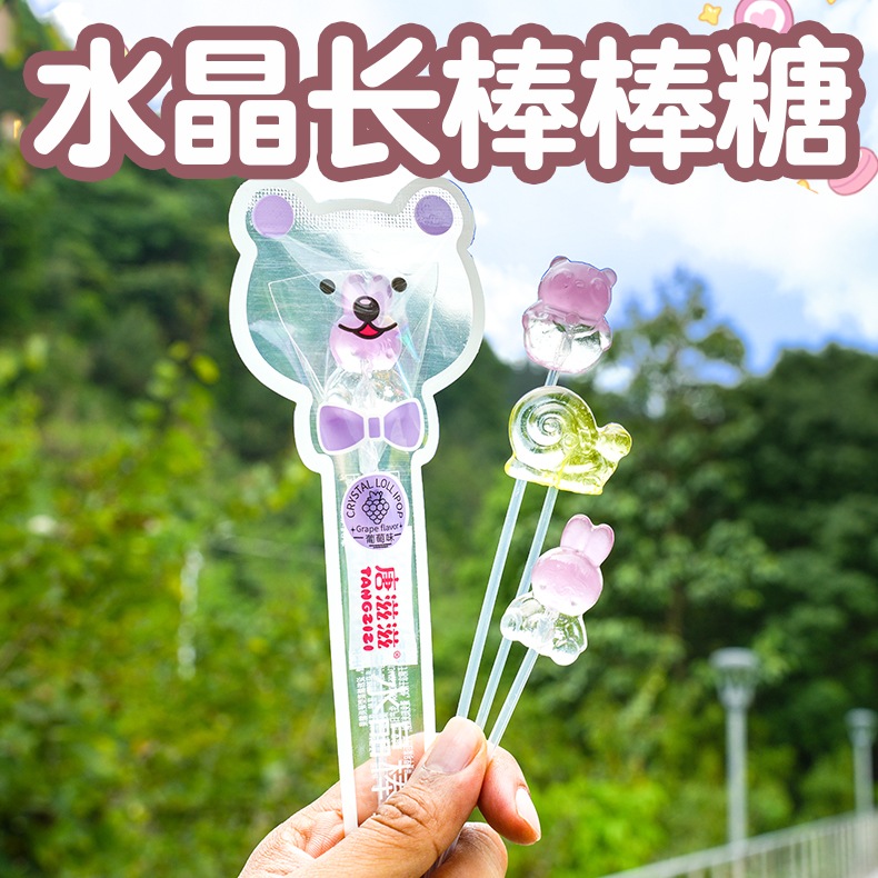 子供の日のかわいいキャンディーで生徒たちにご褒美を与えるロングクリスタルロリポップスナック