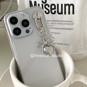 韓国インニッチデザインラブリボンペンダントブロガーの同じ携帯電話ケース15 Iphone15pro/14promax Apple 14/12/11保護カバーに適し高透明ソフトエッジ付き