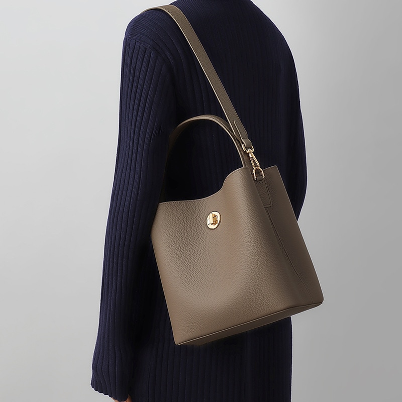 トートバッグ 2025新モデルレディース斜め掛けレディースバッグバケツバッグ本革ワンショルダーバイカーバッグ通勤バッグ